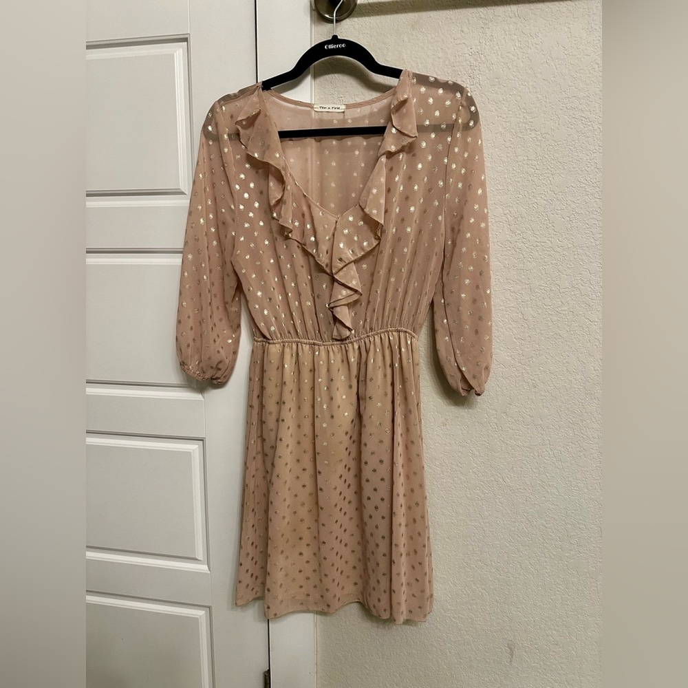 Light pink dress with gold polka dots.